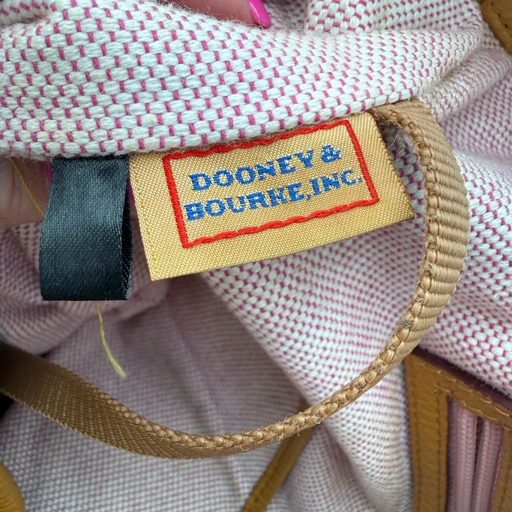 Dooney & Bourke distinctive makes silver